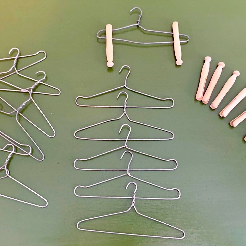 antique metal doll clothes hangers and wood clothes pins